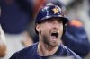 Houston Astros' Cooper Hummel celebrates in the dugout after hitting a home run against the Philadelphia Phillies during the eighth inning of a baseball game Tuesday, June 24, 2025, in Houston. (AP Photo/David J. Phillip)