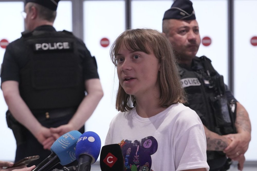 Activist Greta Thunberg arrives from Israel at Charles de Gaulle airport Tuesday, June 10, 2025, north of Paris. (AP Photo/Michel Euler)