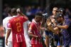 Wydad AC's Cassius Mailula and Wydad AC's Mohamed Moufid try to cool off during the Club World Cup Group G soccer match between Wydad AC and Al Ain FC in Washington, Thursday, June 26, 2025. (AP Photo/Julia Demaree Nikhinson)