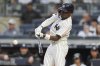 New York Yankees' Jazz Chisholm Jr. hits a home run during the second inning of a baseball game against the Athletics Friday, June 27, 2025, in New York. (AP Photo/Frank Franklin II)