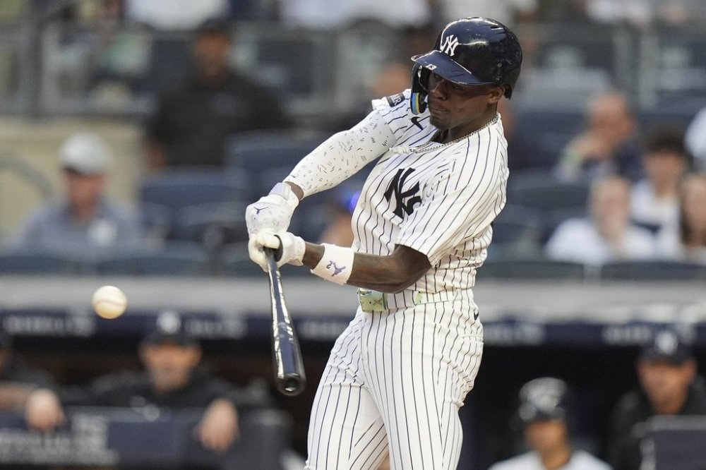 New York Yankees' Jazz Chisholm Jr. hits a home run during the second inning of a baseball game against the Athletics Friday, June 27, 2025, in New York. (AP Photo/Frank Franklin II)