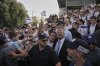 Surrounded by security guards, Israel's far-right National Security Minister Itamar Ben-Gvir, centre, participates in a march marking Jerusalem Day, an Israeli holiday celebrating the capture of East Jerusalem in the 1967 Mideast war, in Damascus Gate of Jerusalem's Old City on Monday, May 26, 2025. (AP Photo/Leo Correa)