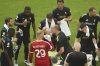 Juventus manager Igor Tudor, center, talks with his players during a water break in the Club World Cup round of 16 soccer match between Real Madrid and Juventus in Miami Gardens, Fla., Tuesday, July 1, 2025. (AP Photo/Marta Lavandier)