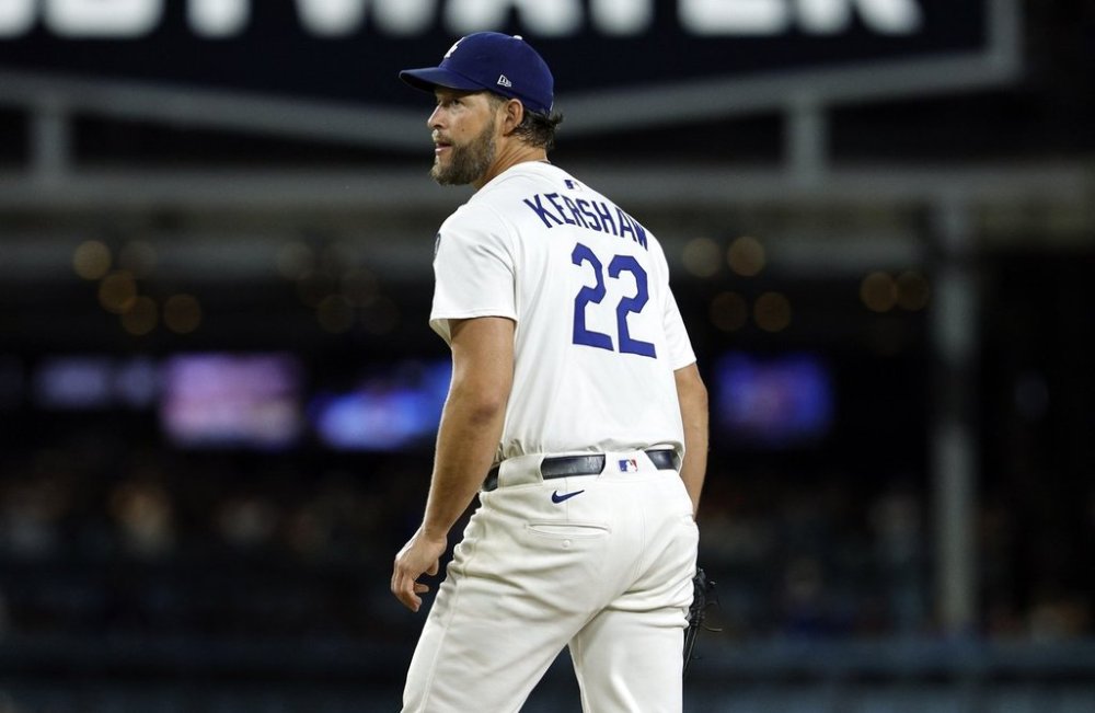 Los Angeles Dodgers pitcher Clayton Kershaw reacts after striking out Chicago White Sox's Vinny Capra during the sixth inning for his 3,000th career strikeout Wednesday, July 2, 2025, in Los Angeles. (AP Photo/Kevork Djansezian)