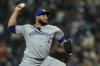 Toronto Blue Jays relief pitcher Yimi Garcia throws during the eighth inning of a baseball game against the Seattle Mariners, Friday, May 9, 2025, in Seattle. (AP Photo/Rio Giancarlo)
