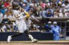 San Diego Padres' Fernando Tatis Jr. hits a home run in the seventh inning of a baseball game against the Kansas City Royals, Saturday, June 21, 2025, in San Diego. (AP Photo/Tony Ding)