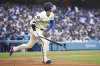 Los Angeles Dodgers designated hitter Shohei Ohtani runs after hitting a home run during the first inning of a baseball game against the San Francisco Giants in Los Angeles, Saturday, June 14, 2025. (AP Photo/Jessie Alcheh)