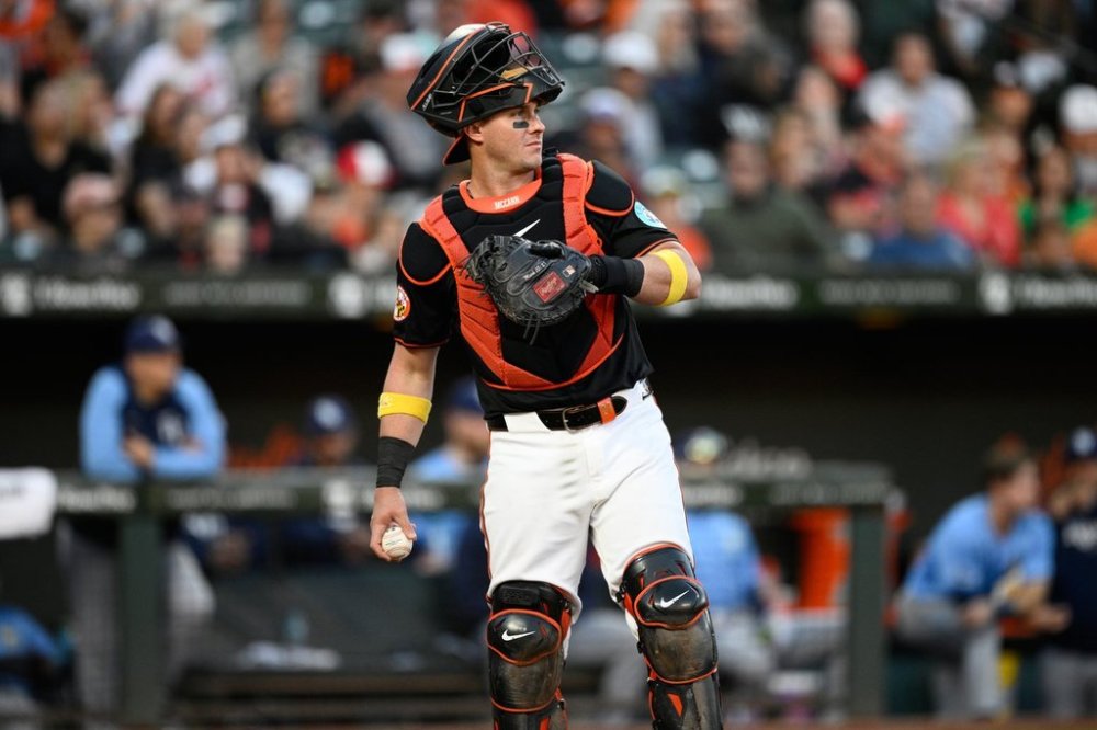 FILE - Baltimore Orioles catcher James McCann (27) looks on during a baseball game against the Tampa Bay Rays, Sept. 7, 2024, in Baltimore. (AP Photo/Nick Wass, File)
