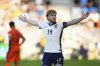 England's Harvey Elliott celebrates after scoring his side's second goal during the semi final soccer match between England and the Netherlands at the European U-21 Championship at the National football stadium in Bratislava, Slovakia, Wednesday, June 25, 2025. (AP Photo/Petr David Josek)