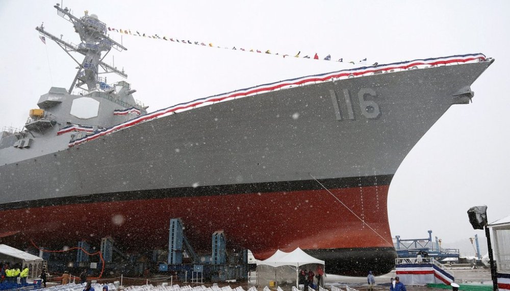 FILE - The future USS Thomas Hudner, a U.S. Navy destroyer named after Korean War veteran Thomas Hudner, during christening ceremony at Bath Iron Works in Bath, Maine, April 1, 2017. The ship was commissioned, Dec. 1, 2018 in Boston. (AP Photo/Mary Schwalm, File)
