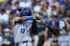 Kansas City Royals' Salvador Perez follows through on a two-run double to score Bobby Witt Jr. and Vinnie Pasquantino against the Seattle Mariners during the fifth inning of a baseball game Tuesday, July 1, 2025, in Seattle. (AP Photo/Lindsey Wasson)