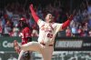 St. Louis Cardinals' Yohel Pozo (63) celebrates after hitting a walk-off single as Cincinnati Reds shortstop Elly De La Cruz watches to defeat the Reds in the 11th inning of a baseball game Saturday, June 21, 2025, in St. Louis. (AP Photo/Jeff Roberson)