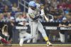 Milwaukee Brewers' Jackson Chourio hits a RBI double to score Christian Yelich during the eighth inning of a baseball game against the Miami Marlins, Friday, July 4, 2025, in Miami. (AP Photo/Lynne Sladky)