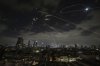 The Israeli Iron Dome air defense system fires to intercept missiles during an Iranian attack over Tel Aviv, Israel, Sunday, June 15, 2025. (AP Photo/Leo Correa)