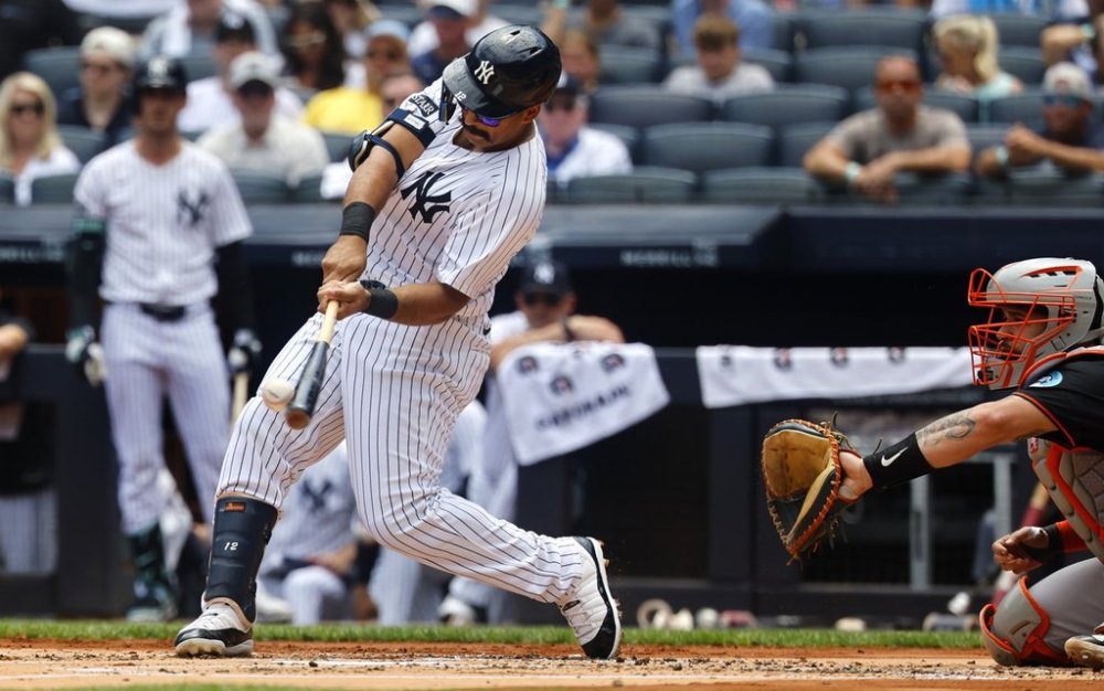 New York Yankees' Trent Grisham hits a home run during the first inning of a baseball game against the Baltimore Orioles, Saturday, June 21, 2025, in New York. (AP Photo/Noah K. Murray)