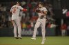 Washington Nationals second baseman Luis Garcia Jr. (2) celebrates with Nationals' left fielder James Wood after the final out of the ninth inning of a baseball game against the Los Angeles Angels, Friday, June 27, 2025, in Anaheim, Calif. (AP Photo/Jayne Kamin-Oncea)