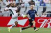 Fluminense's Samuel Xavier (2) plays the ball in front of Inter Milan's Federico Dimarco (32) during the Club World Cup round of 16 soccer match between Inter Milan and Fluminense in Charlotte, N.C., Monday, June 30, 2025. (AP Photo/Nell Redmond)