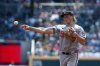 Baltimore Orioles second baseman Jackson Holliday throws to first for the out on Atlanta Braves' Drake Baldwin during the second inning of a baseball game, Sunday, July 6, 2025, in Atlanta. (AP Photo/Butch Dill)