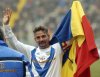 FILE -Brescia soccer star Roberto Baggio celebrates after scoring during the Italian first division soccer match between Parma and Brescia at the Tardini stadium in Parma, Italy, March 14, 2004. (AP Photo/Marco vasini, File)