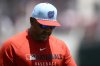 Washington Nationals manager Dave Martinez wears a patriotic themed cap as he walks back to the dugout after a pitching change during the fifth inning of a baseball game against the Boston Red Sox, Friday, July 4, 2025, in Washington. (AP Photo/Nick Wass)