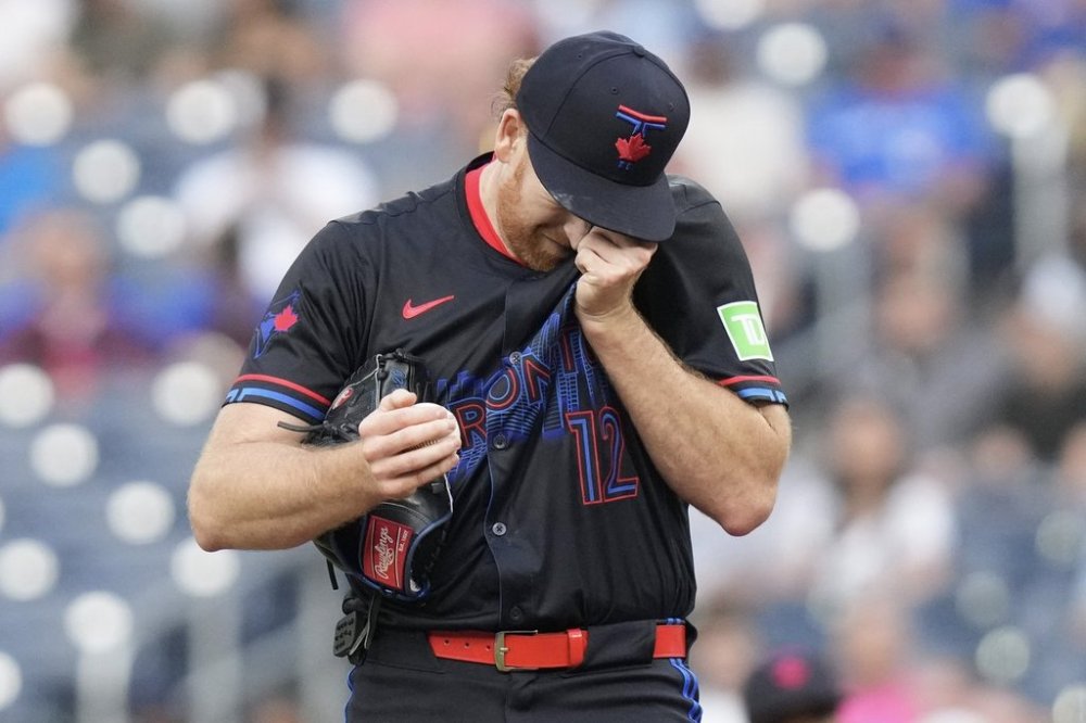 Toronto Blue Jays pitcher Spencer Turnbull (12) reacts during second inning MLB baseball action against the Chicago White Sox in Toronto on Friday June 20, 2025. THE CANADIAN PRESS/Chris Young