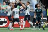 Vancouver Whitecaps' Damir Kreilach (19) celebrates his goal against the Seattle Sounders with Daniel Rios, left, and Edier Ocampo (18) during the second half of an MLS soccer match in Vancouver, on Sunday, June 8, 2025. THE CANADIAN PRESS/Ethan Cairns