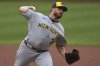Milwaukee Brewers pitcher Aaron Civale delivers during the first inning of a baseball game against the Pittsburgh Pirates in Pittsburgh, Thursday, May 22, 2025. (AP Photo/Gene J. Puskar)