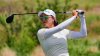 Minjee Lee hits a tee shot on the second hole during the third round of the Women's PGA Championship golf tournament Saturday, June 21, 2025, in Frisco, Texas. (AP Photo/LM Otero)