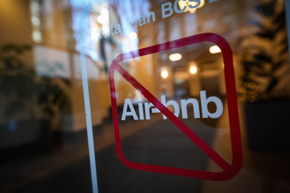 A sign indicating Airbnb rentals are not permitted is seen at the entrance to a condo tower, in Vancouver, on Thursday, Nov. 23, 2023. THE CANADIAN PRESS/Darryl Dyck