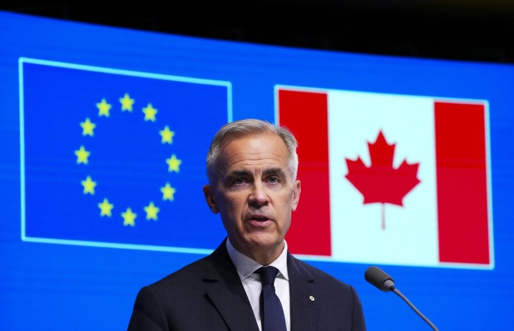 Prime Minister Mark Carney takes part in a press conference during the Canada EU Summit in Brussels, Belgium on Monday, June 23, 2025. THE CANADIAN PRESS/Sean Kilpatrick