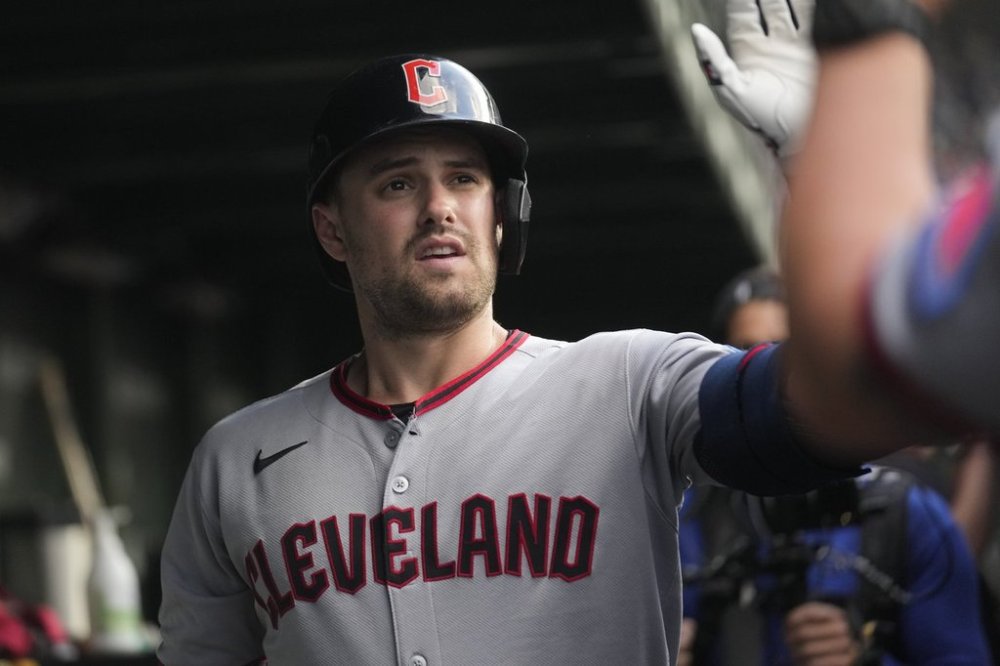 Cleveland Guardians' Lane Thomas (8) celebrates after hitting a solo home run during the second inning of a baseball game against the Chicago Cubs, Wednesday, July 2, 2025, in Chicago. (AP Photo/Erin Hooley)