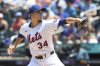 New York Mets pitcher Kodai Senga throws during the first inning of a baseball game against the Washington Nationals, Thursday, June 12, 2025, in New York. (AP Photo/Pamela Smith)