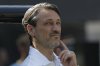 Borussia Dortmund's coach Niko Kovac waits for the beginning of the Club World Cup quarterfinal soccer match between Real Madrid and Borussia Dortmund in East Rutherford, N.J., Saturday, July 5, 2025. (AP Photo/Adam Hunger)