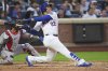 New York Mets' Juan Soto follows through on a home run during the third inning of a baseball game against the Washington Nationals Tuesday, June 10, 2025, in New York. (AP Photo/Frank Franklin II)