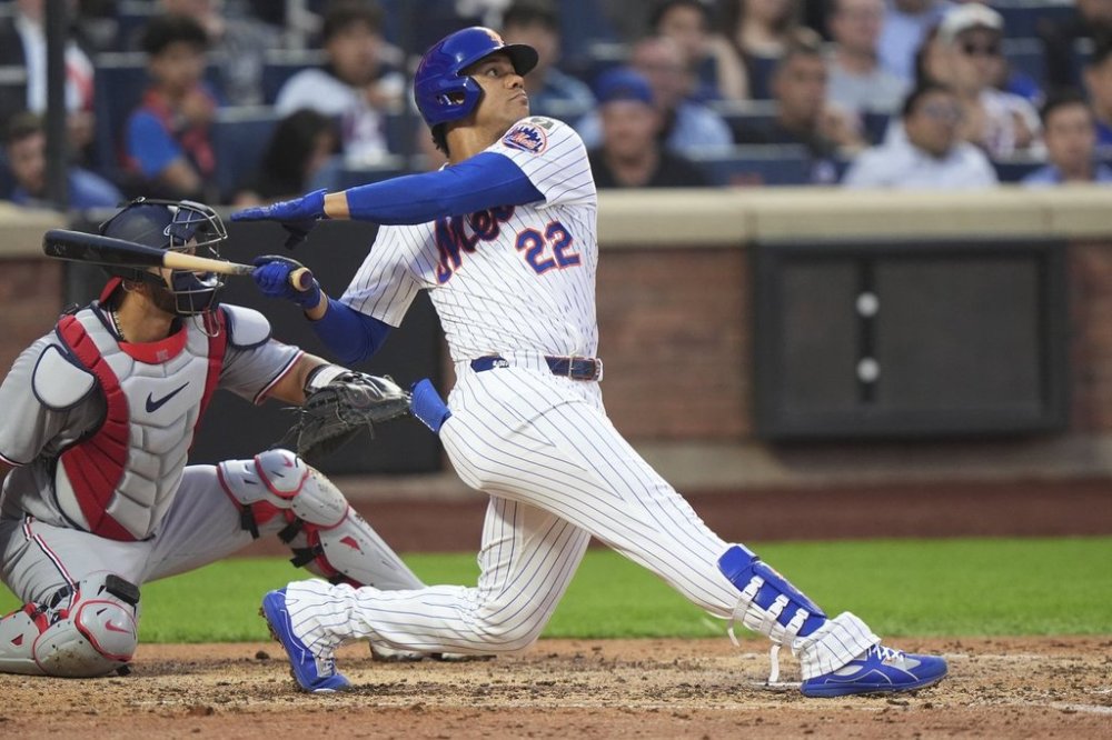 New York Mets' Juan Soto follows through on a home run during the third inning of a baseball game against the Washington Nationals Tuesday, June 10, 2025, in New York. (AP Photo/Frank Franklin II)