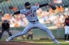 Detroit Tigers starting pitcher Casey Mize (12) delivers during the first inning of a baseball game Baltimore Orioles, Wednesday, June 11, 2025, in Baltimore. (AP Photo/Stephanie Scarbrough)