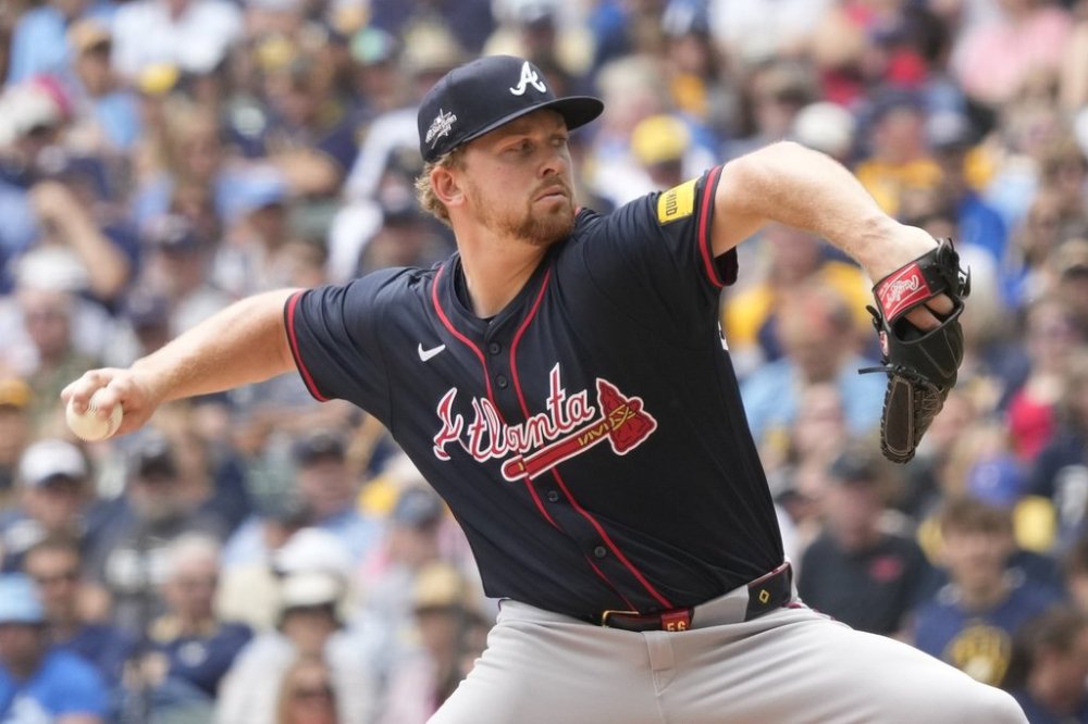 Atlanta Braves pitcher Spencer Schwellenbach (56) throws during the first inning of a baseball game against the Milwaukee Brewers, Wednesday, June 11, 2025, in Milwaukee. (AP Photo/Kayla Wolf)