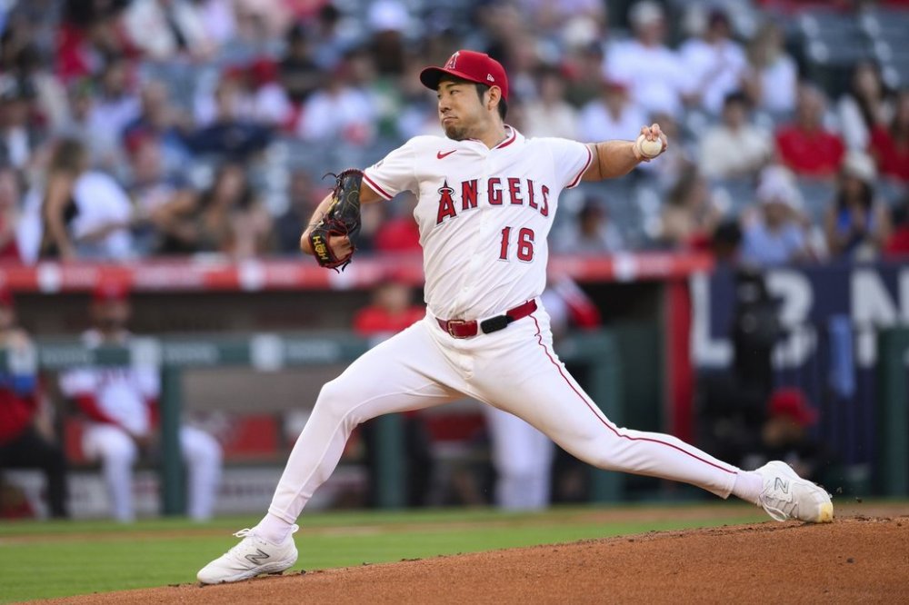 Los Angeles Angels pitcher Yusei Kikuchi delivers a pitch during the first inning of a baseball game against the Athletics, Monday, June 9, 2025, in Anaheim, Calif. (AP Photo/William Liang)