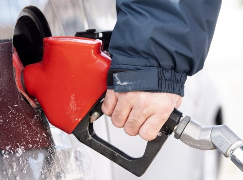 A man pumps gas in Montreal, Friday, March 4, 2022. THE CANADIAN PRESS/Graham Hughes