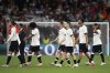 Germany players leave the field at the end of the Nations League semifinal soccer match between Portugal and Germany at the Munich Football Arena, in Munich, Germany, Wednesday, June 4, 2025. (AP Photo/Martin Meissner)