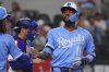 Kansas City Royals' Maikel Garcia celebrates his home run that scored teammates Jonathan India and Bobby Witt Jr. during the fourth inning of a baseball game against the Texas Rangers, Wednesday, June 18, 2025, in Arlington, Texas. (AP Photo/LM Otero)
