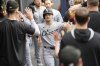 Chicago White Sox's Andrew Benintendi (23) celebrates in the dug out after hitting a solo home run off Toronto Blue Jays pitcher Spencer Turnbull during first inning MLB baseball action in Toronto on Friday June 20, 2025. THE CANADIAN PRESS/Chris Young