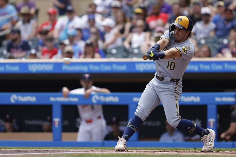Milwaukee Brewers' Sal Frelick (10) hits a single off of Minnesota Twins pitcher Simeon Woods Richardson during the first inning of a baseball game, Saturday, June 21, 2025, in Minneapolis. (AP Photo/Bailey Hillesheim)