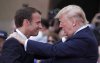 FILE - French President Emmanuel Macron, left, meets U.S President Donald Trump during a ceremony to mark the 75th anniversary of D-Day at the Normandy American Cemetery in Colleville-sur-Mer, Normandy, France, on June 6, 2019. (Ian Langsdon/Pool via AP, File)