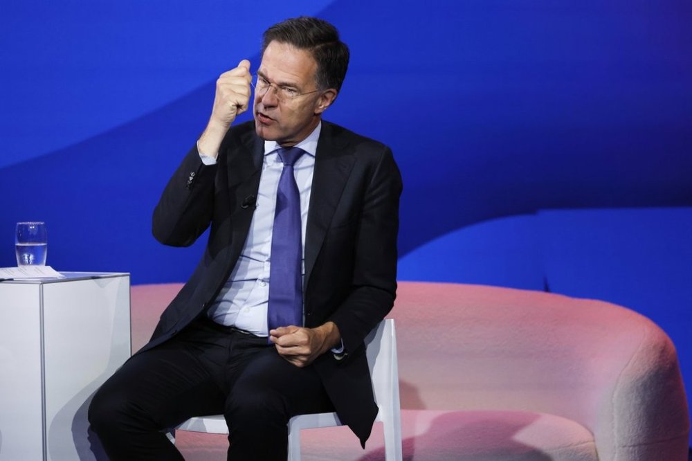 NATO Secretary General Mark Rutte addresses the audience at the NATO public forum on the sidelines of the NATO summit in The Hague, Netherlands, Tuesday, June 24, 2025. (AP Photo/Geert Vanden Wijngaert)