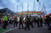 Police officers patrol outside B.C. Place Stadium before the opening night of the Taylor Swift Eras Tour concert, in Vancouver, on Friday, Dec. 6, 2024. THE CANADIAN PRESS/Darryl Dyck