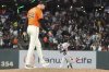 San Francisco Giants pitcher Sean Hjelle, foreground, reacts after a home run by Boston Red Sox's Ceddanne Rafaela, bottom, during the sixth inning of a baseball game in San Francisco, Friday, June 20, 2025. (AP Photo/Jeff Chiu)