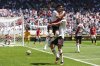 River Plate's Maximiliano Meza (8) celebrates after scoring his side's third goal with German Pezzella (6) during the Club World Cup group E soccer match between River Plate and Urawa Red Diamonds in Seattle, Tuesday, June 17, 2025. (AP Photo/Lindsey Wasson)
