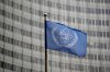 FILE - The flag of the International Atomic Energy Agency flies in front of its headquarters during an IAEA Board of Governors meeting in Vienna, Austria, Wednesday, Nov. 22, 2023. (AP Photo/Matthias Schrader, File)