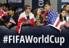 FILE - Fans wait along 6th Ave. for FIFA's announcement of the names of the host cities for the 2026 World Cup soccer tournament, Thursday, June 16, 2022, in New York. (AP Photo/Noah K. Murray, File)